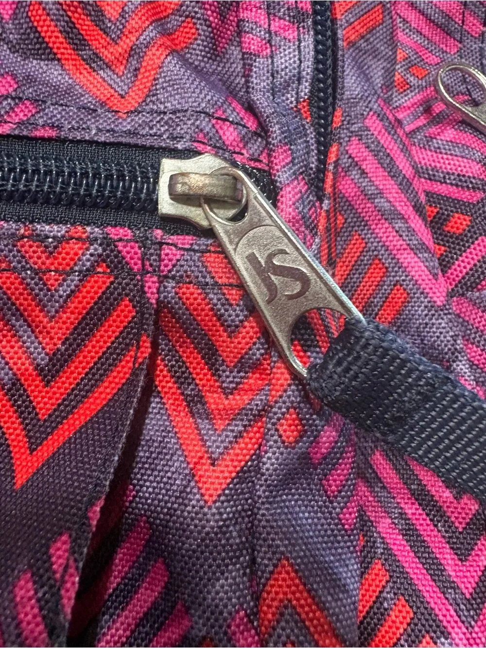 Jansport Purple Backpack with Pink & Red Chevron Print no tears